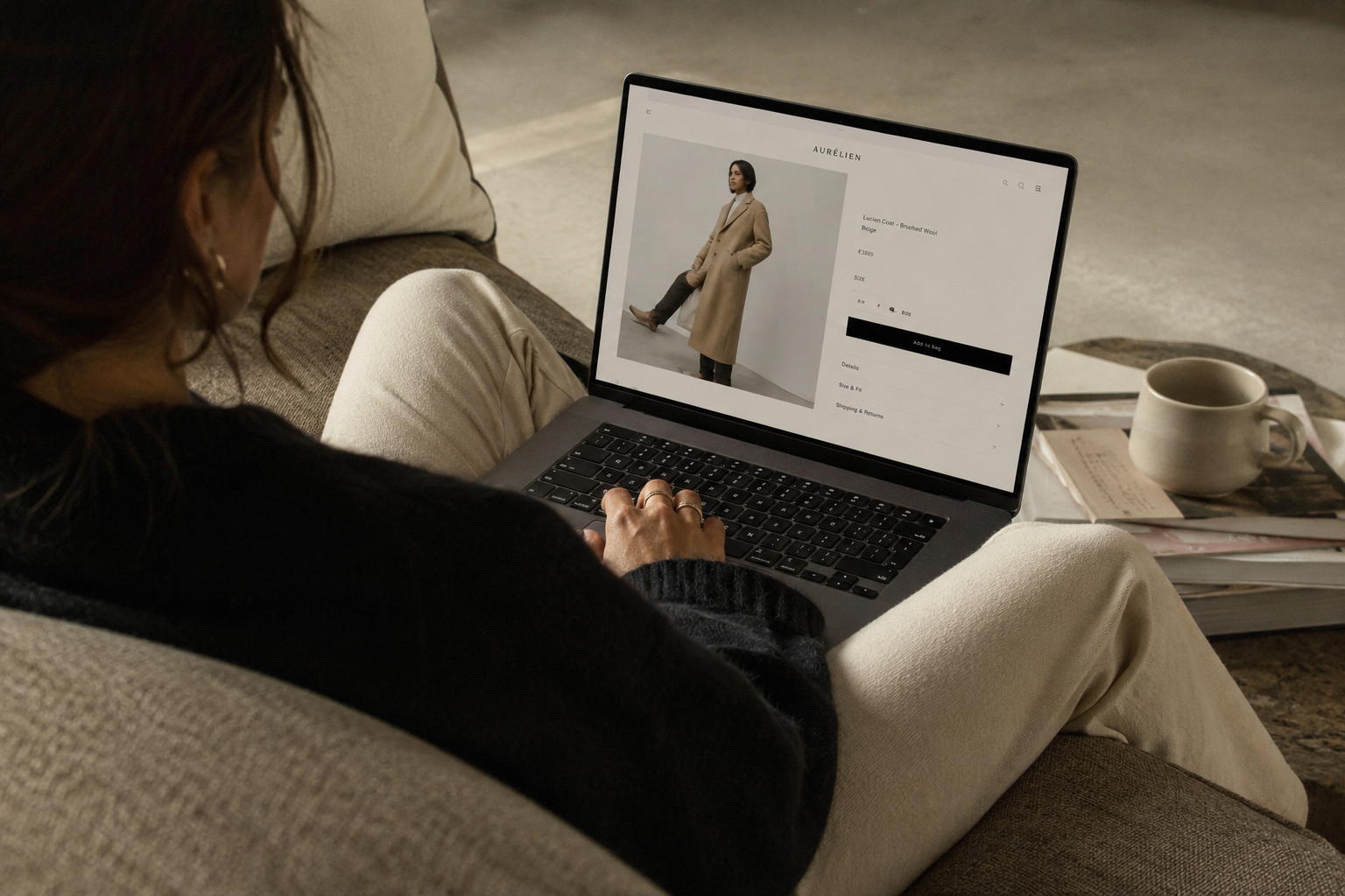 Woman buying clothes on her laptop