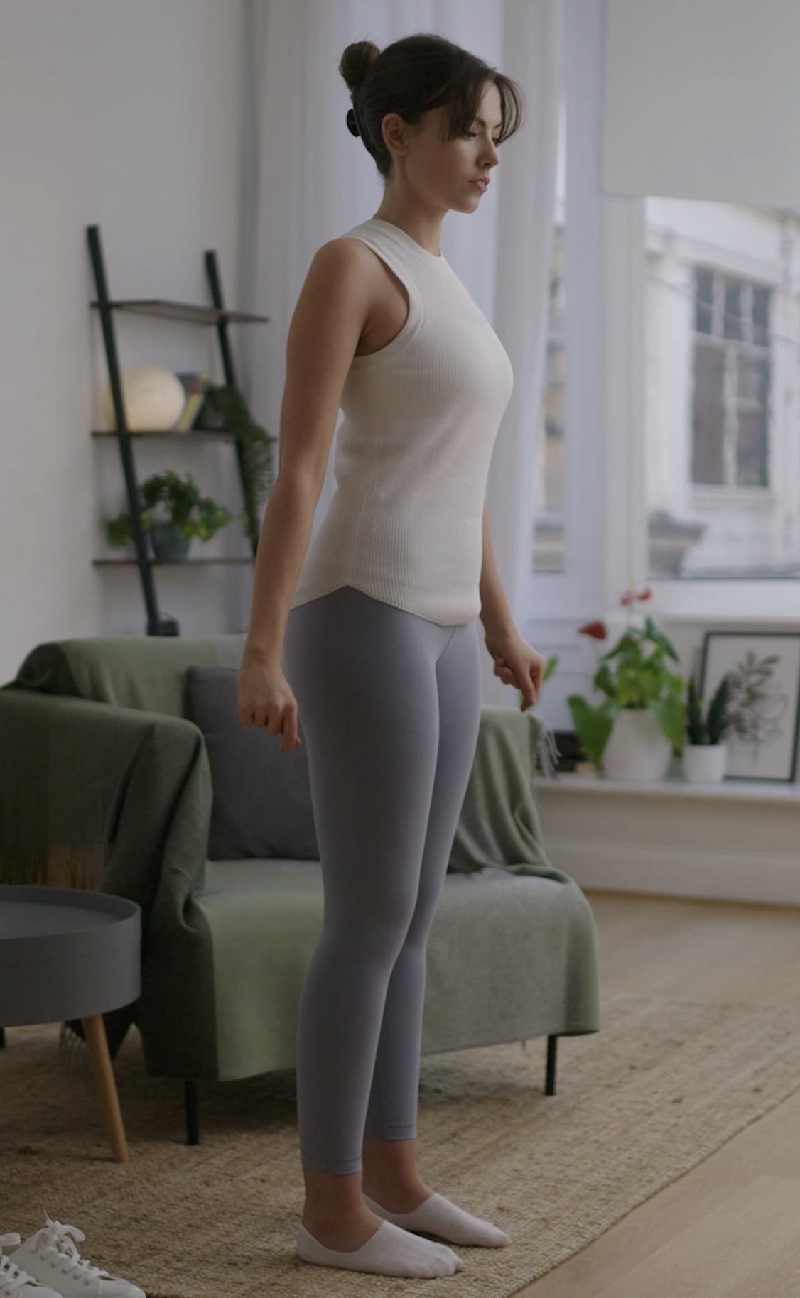 Female using smartphone to take accurate body scan